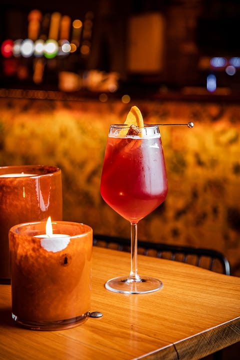 A spritz by candlelight at the Ten Streets Social bar