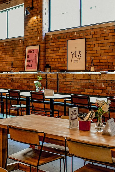 The daylight warehouse hall at Ten Streets Social